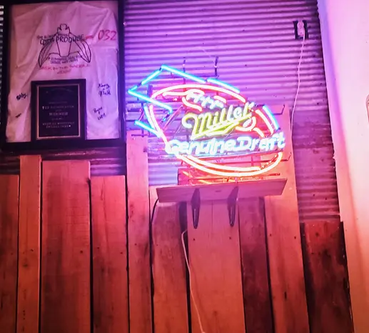 neon sign inside the barn at sidetrack rv park
